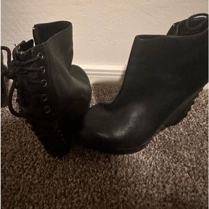 Black wedge booties that tie on the back..Gianni bini